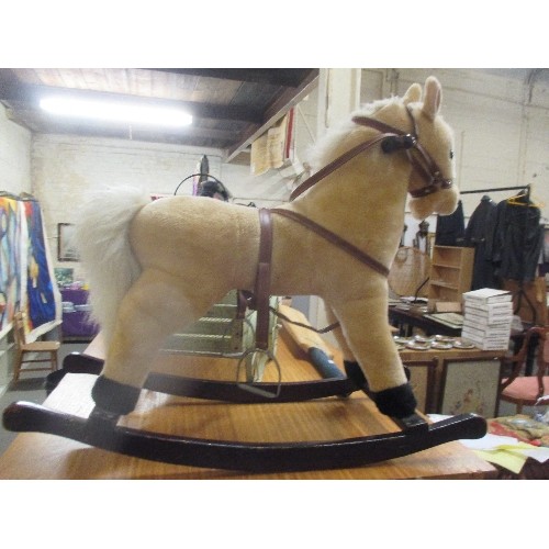 132 - A ROCKING HORSE ON WOODEN ROCKER - 73CM X 64CM