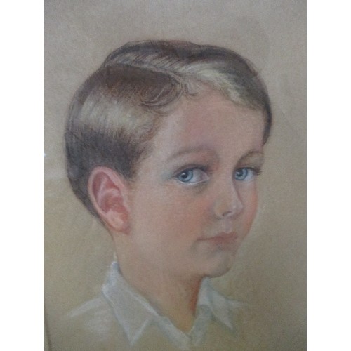 182 - CIRCA 1950 PASTEL PORTRAIT OF A YOUNG BOY, SIGNED BY THE ARTIST OWEN LUNNON (AN ARTIST BETTER KNOWN ... 