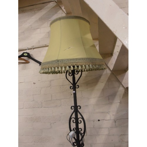 170 - WROUGHT IRON STANDARD LAMP BASE, WITH APPLE-GREEN TASSELLED SHADE.