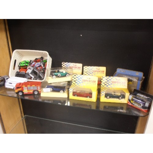 210 - QUANTITY OF MODEL CARS. MOSTLY BOXED. MAISTO SUPER CAR COLLECTION , ERTL ETC.