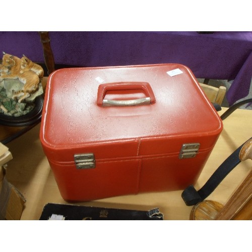 226 - A LARGE BRIGHT RED VANITY CASE[WITH KEY] ALSO A BLACK BRIEFCASE.