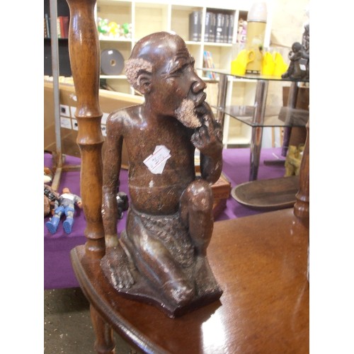 228 - HEAVY SOAPSTONE FIGURE OF A KNEELING BEARDED MAN. APPROX 24CM H.