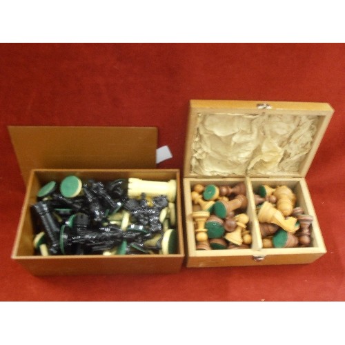 135 - 2 CHESS SETS. 1 SET IS CARVED WOOD (STAUNTON), THE OTHER IS GLOSS BLACK/CREAM. BOTH BOXED.