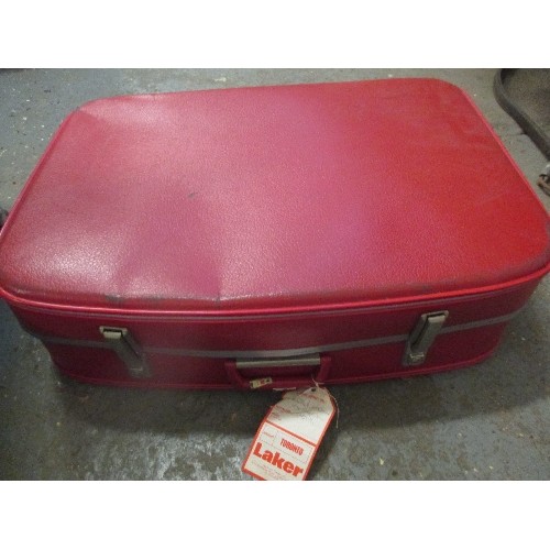 380 - LARGE BRIGHT-RED RETRO RIGID SUITCASE. LUGGAGE LABELS [TO NOTRE-DAME] STILL ATTACHED. APPROX 70CM L/... 