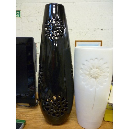 376 - TALL BROWN GLAZED VASE WITH PIERCED FLORAL DESIGN 52CM AND AN IVORY COLOURED VASE WITH FLOWER DESIGN