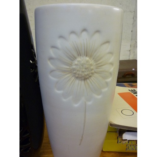 376 - TALL BROWN GLAZED VASE WITH PIERCED FLORAL DESIGN 52CM AND AN IVORY COLOURED VASE WITH FLOWER DESIGN