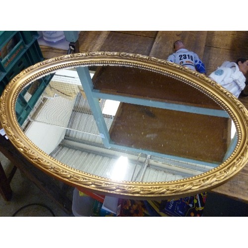 425 - GILT OVAL WALL MIRROR - 63CM X 40CM