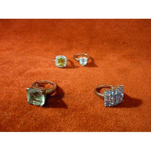 22 - FOUR 925 SILVER DRESS RINGS WITH STONES IN GREEN AND BLUE SHADES