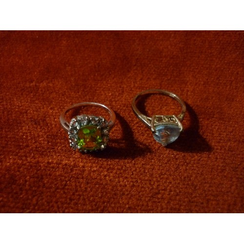 22 - FOUR 925 SILVER DRESS RINGS WITH STONES IN GREEN AND BLUE SHADES