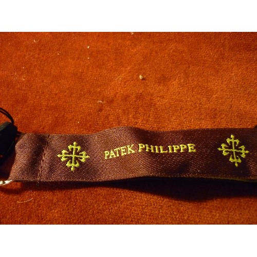 47 - A PATEK PHILLIPE KEY / ID HOLDER NECK SASH