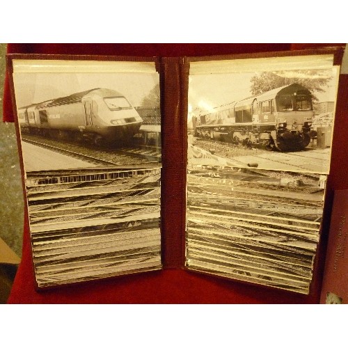 114 - LARGE QUANTITY OF BLACK & WHITE TRAIN/LOCOMOTIVE PHOTOGRAPHS. CONTAINED IN 4 ALBUMS.