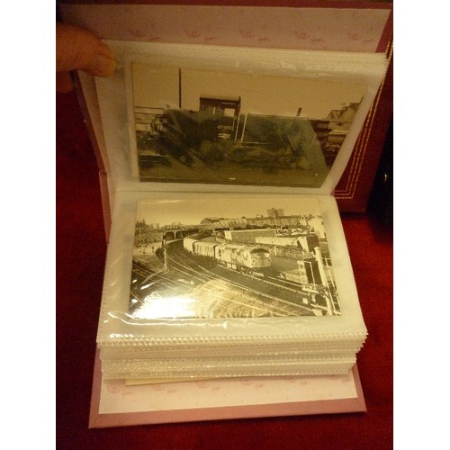 114 - LARGE QUANTITY OF BLACK & WHITE TRAIN/LOCOMOTIVE PHOTOGRAPHS. CONTAINED IN 4 ALBUMS.