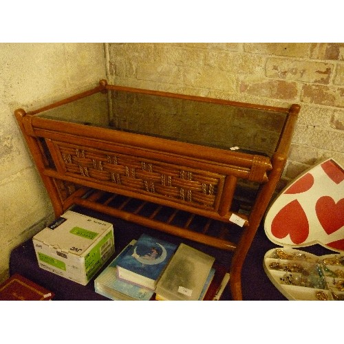 147 - RETRO SMOKED GLASS-TOPPED COFFEE TABLE, WITH BASKET WEAVE SIDES AND END. BOTTOM SLATTED SHELF. 80 CM... 