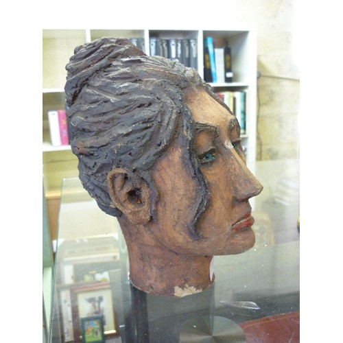 174 - STUDIO POTTERY HEAD OF WOMAN. 24CM H.