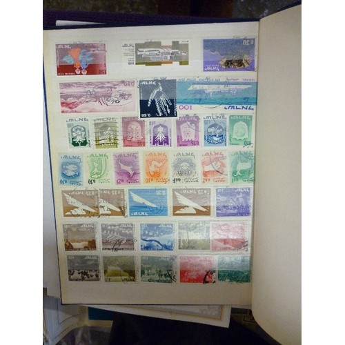 180 - STAMP COLLECTION. VINTAGE STAMP ALBUMS CONTAINING MANY STAMPS. INCLUDING AN ALBUM OF USA & SOUTH AME... 
