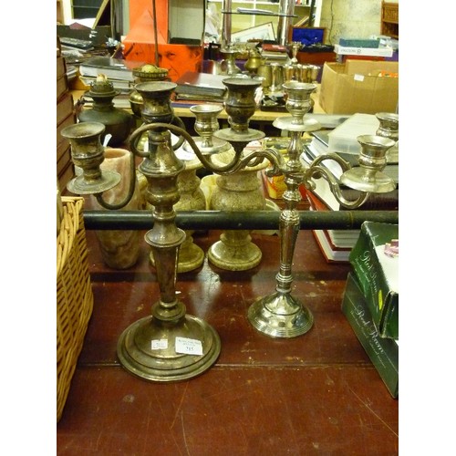 215 - A VINTAGE SILVER-PLATE CANDELABRA WITH 3 HOLDERS, ALSO A MORE RECENT ONE WITH 5 HOLDERS.