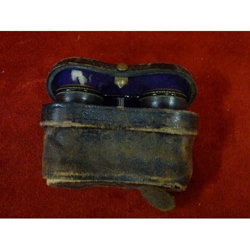 270 - TINY VINTAGE OPERA GLASS/ BINOCULARS. IN ORIGINAL LEATHER CASE[VERY FRAGILE AND WELL WORN]