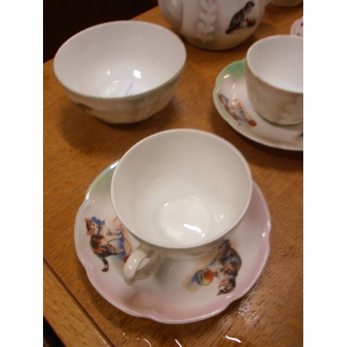 334 - LOVELY 1930'S CHILD'S TEA SET. TEA POT, SUGAR BOWL AND MILK JUG, CUPS & SAUCERS. DECORATED WITH CATS... 