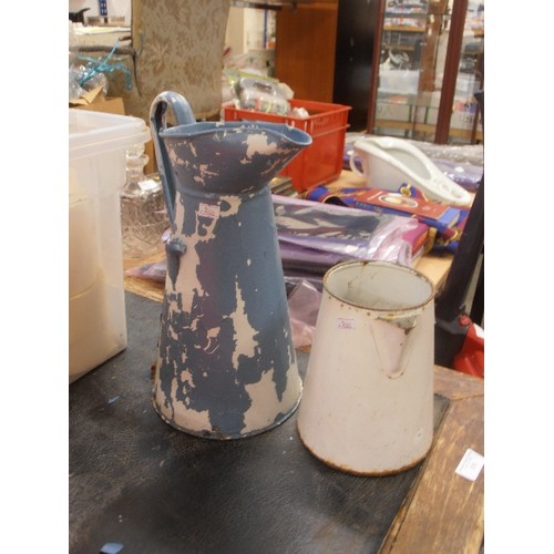 350 - 2 LARGE ENAMEL JUGS. ONE HAS BEEN PAINTED BLUE BUT HAS PEELED OFF.