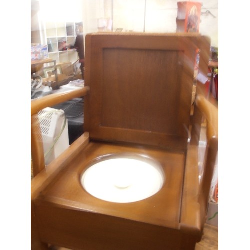 381 - RETRO VINTAGE COMMODE. COMPLETE WITH CERAMIC BUCKET/LID. PADDED SEAT AND BACK.