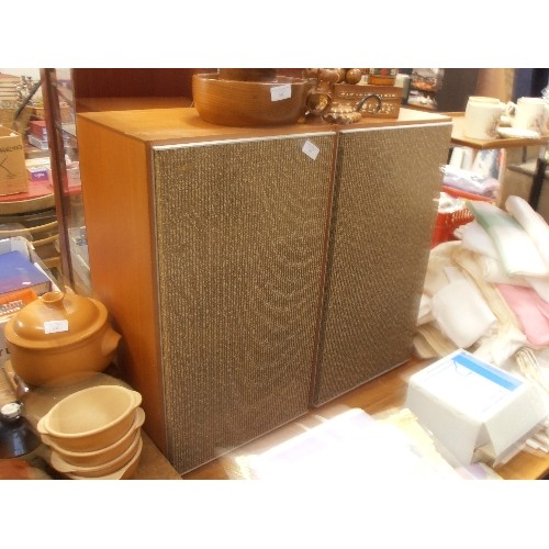 387 - A PAIR OF LARGE RETRO 'LEAK' SPEAKERS. TEAK WITH BROWN/BEIGE TEXTURED FABRIC FRONT.