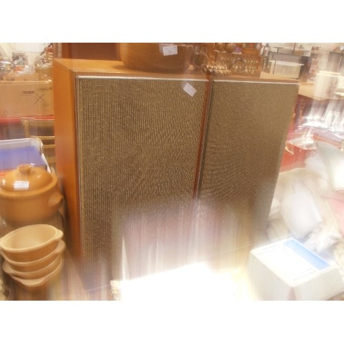 387 - A PAIR OF LARGE RETRO 'LEAK' SPEAKERS. TEAK WITH BROWN/BEIGE TEXTURED FABRIC FRONT.