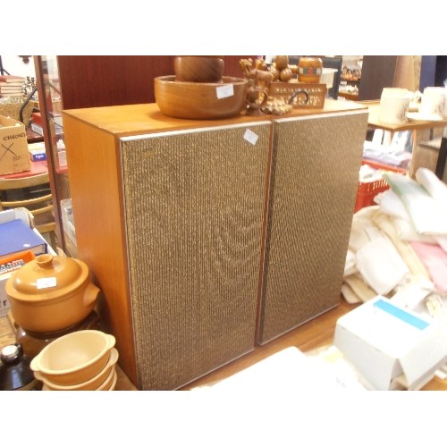 387 - A PAIR OF LARGE RETRO 'LEAK' SPEAKERS. TEAK WITH BROWN/BEIGE TEXTURED FABRIC FRONT.