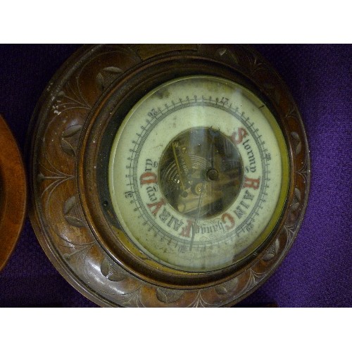 152 - 4 VINTAGE BAROMETERS, WITH WOODEN SURROUNDS, VARIOUS  STYLES AND AGE.