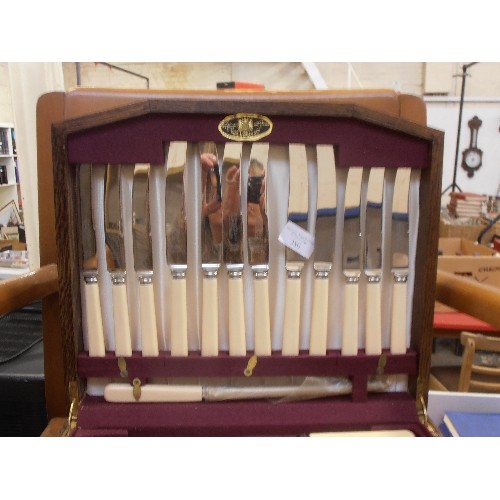 380 - VINTAGE THOMAS TURNER CANTEEN OF CUTLERY, INCLUDES CARVING SET. IN HEAVY OAK LIDDED CASE.