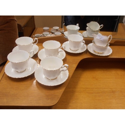 408 - FINE BONE CHINA TEA SET. WHITE WITH GOLD RIM.