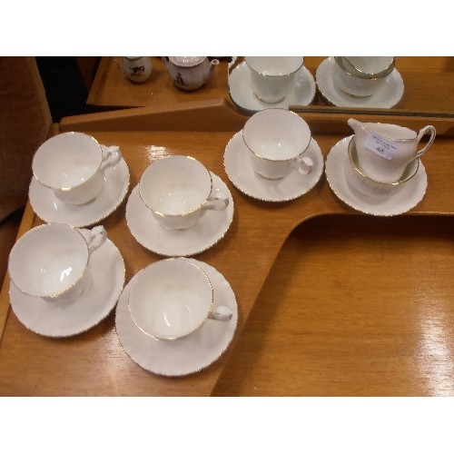 408 - FINE BONE CHINA TEA SET. WHITE WITH GOLD RIM.