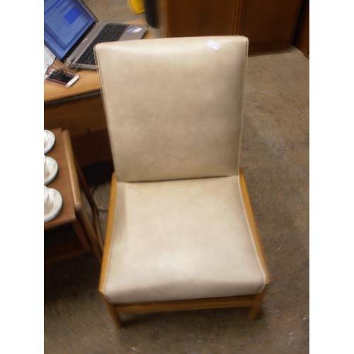 413 - CREAM LEATHERETTE PADDED CHAIR. LOW HEIGHT SEAT.