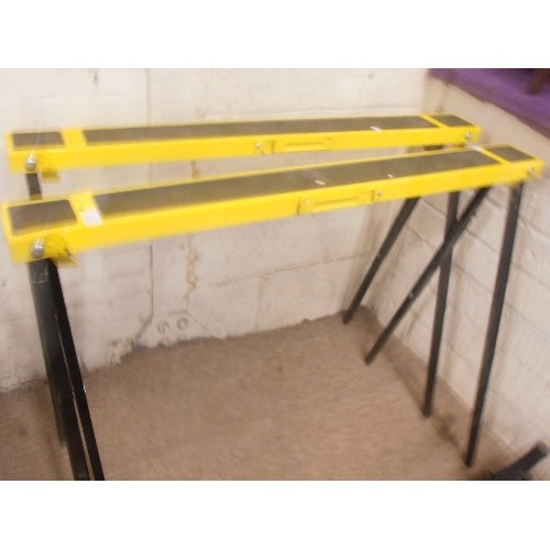 119 - PAIR OF METAL TRESTLES, WITH NON-SLIP PADS.