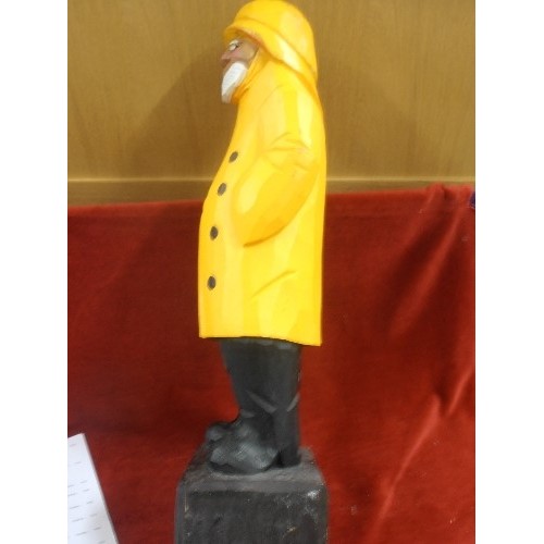 182 - LOVELY LARGE CARVED WOODEN FISHERMAN, IN HIS BRIGHT YELLOW COAT AND HAT. 60CM H.