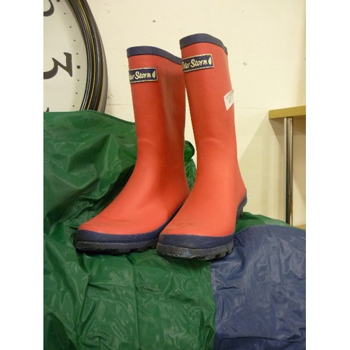 363 - PINK PETER STORM WELLY-BOOTS.  SIZE 5 HARDLY WORN, AND A LARGE WATERPROOF TREKTONIA CAPE IN GREEN AN... 