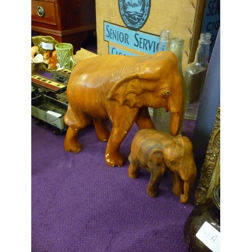 102A - 2 WOODEN ELEPHANT FIGURES