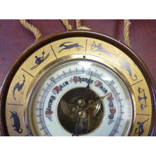 169 - SMALL BAROMETER. FEATURES ZODIAC SIGNS. CIRCULAR & WALL HANGING.