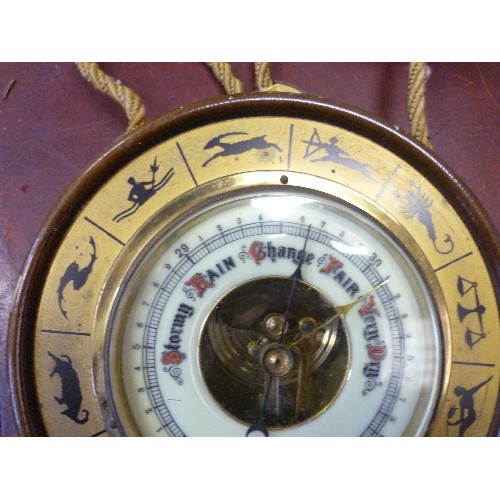 169 - SMALL BAROMETER. FEATURES ZODIAC SIGNS. CIRCULAR & WALL HANGING.