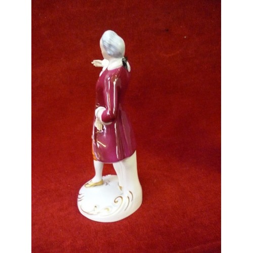 7 - A ROYAL DUX FIGURE OF A GEORGIAN GENTLEMAN IN RED COAT - IMPRESSED, PRINTED AND PINK TRIANGLE MARKS ... 