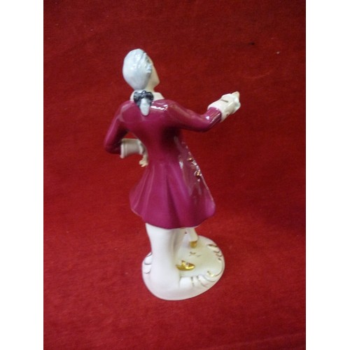 7 - A ROYAL DUX FIGURE OF A GEORGIAN GENTLEMAN IN RED COAT - IMPRESSED, PRINTED AND PINK TRIANGLE MARKS ... 