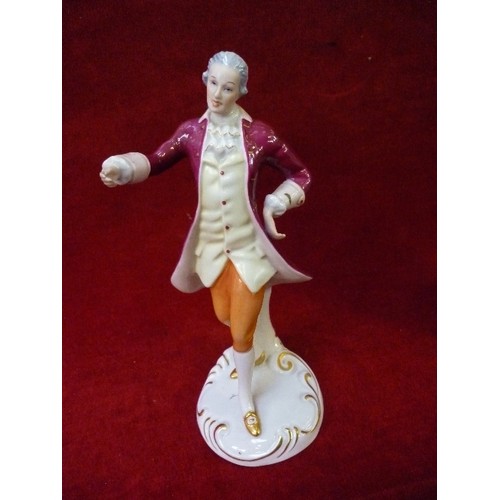 7 - A ROYAL DUX FIGURE OF A GEORGIAN GENTLEMAN IN RED COAT - IMPRESSED, PRINTED AND PINK TRIANGLE MARKS ... 