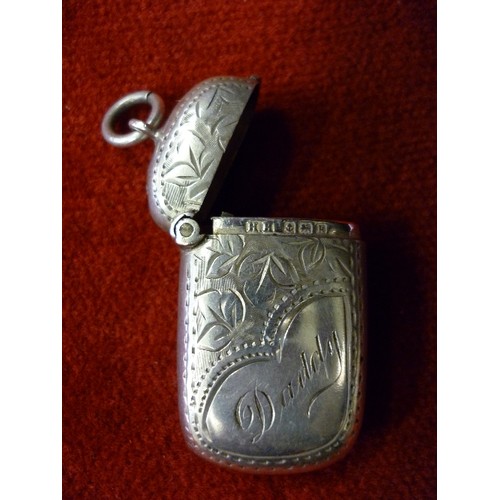 99 - STERLING SILVER VESTA CASE ENGRAVED WITH A LEAF DESIGN AND INSCRIBED 