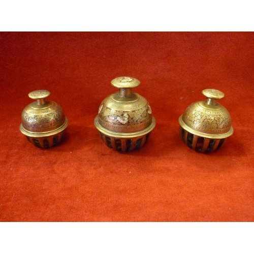 89 - THREE EARLY 20TH CENTURY INDIAN BENARES BRASS ELEPHANT BELLS - GRADUATED SIZES - THE LARGEST 11CM