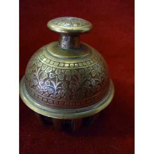 89 - THREE EARLY 20TH CENTURY INDIAN BENARES BRASS ELEPHANT BELLS - GRADUATED SIZES - THE LARGEST 11CM