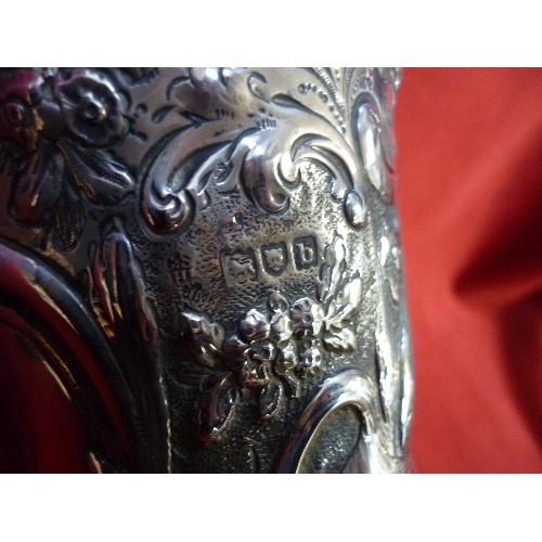 78 - A BEAUTIFUL LARGE VICTORIAN STERLING SILVER FLOWER VASE, HEAVILY EMBOSSED WITH A DESIGN OF SWANS AND... 