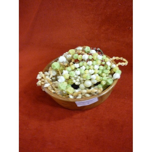 66 - WOODEN BOWL OF COSTUME JEWELLERY NECKLACES IN SHELL, METAL AND BEADS