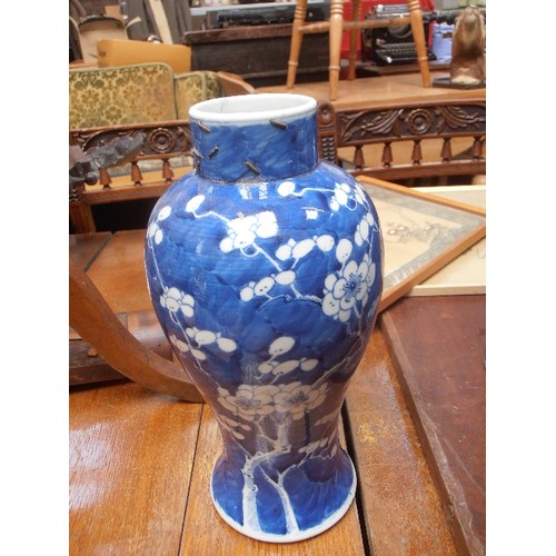 165 - A LARGE 19TH CENTURY CHINESE BLUE AND WHITE BALUSTER SHAPED PRUNUS VASE WITH KANGXI FOUR CHARACTER M... 