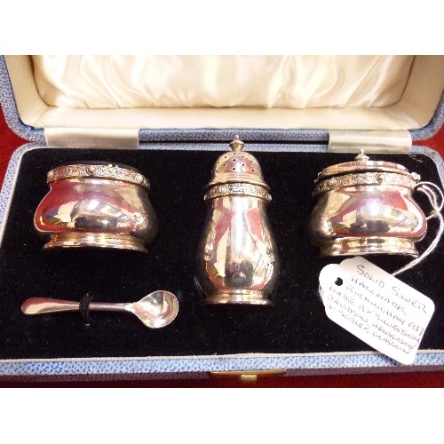 33 - STERLING SILVER CONDIMENT SET, BIRMINGHAM 1937. THE RIMS WITH CELTIC DESIGN IN THE STYLE OF OMAR RAM... 