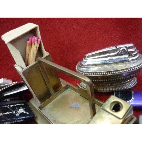 101 - BRASS MATCHBOX HOLDER, CIGAR CUTTER AND ASHTRAY TOGETHER WITH SIX LIGHTERS  INCLUDING A RONSON  TABL... 