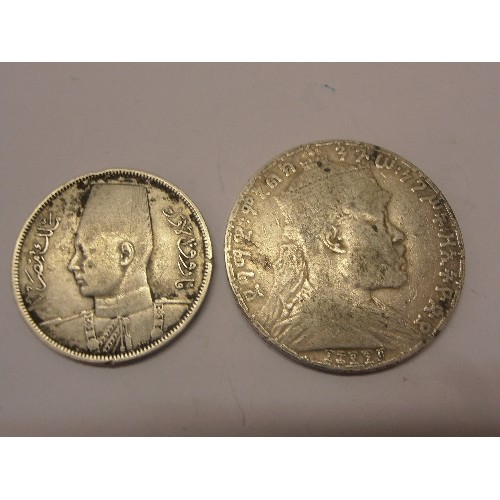 131 - 2 SILVER COINS A 1939 EGYPTIAN 10 PIASTERS, KING FAROUK .833 SILVER WEIGHT 14 GR.    
AN ETHIOPIAN S... 